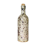 Bottle vase in speckled sandstone