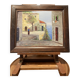 Oil on wood framed by a landscape