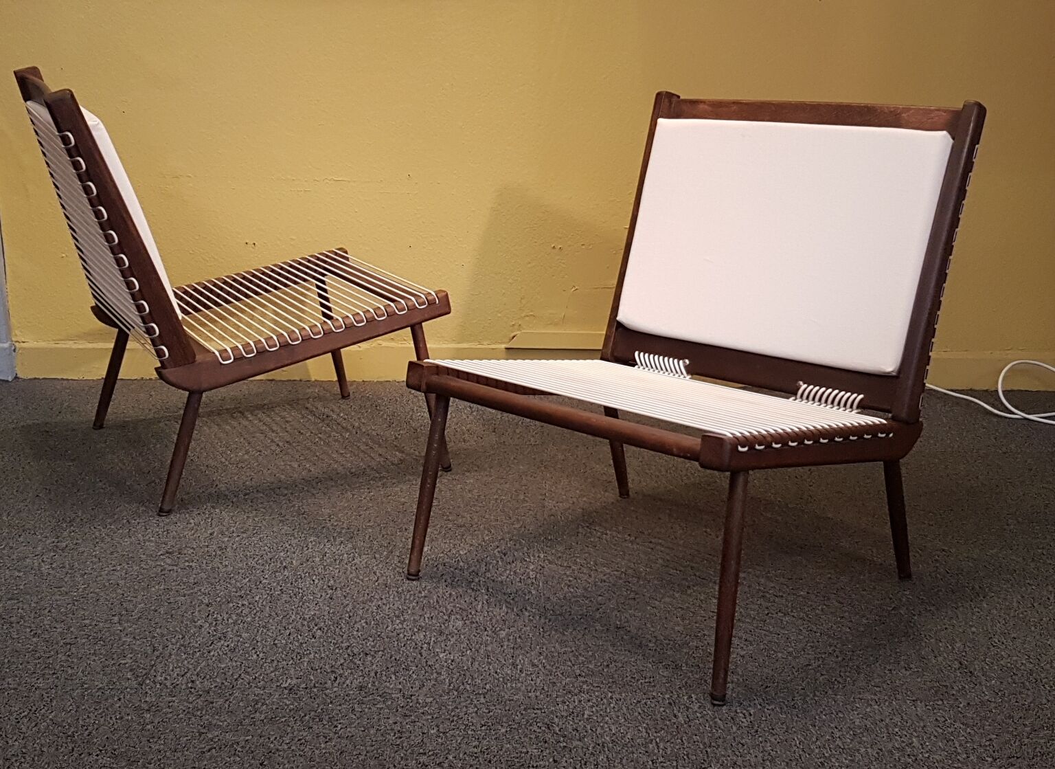 Triumph low armchairs by George Tigien for the European House