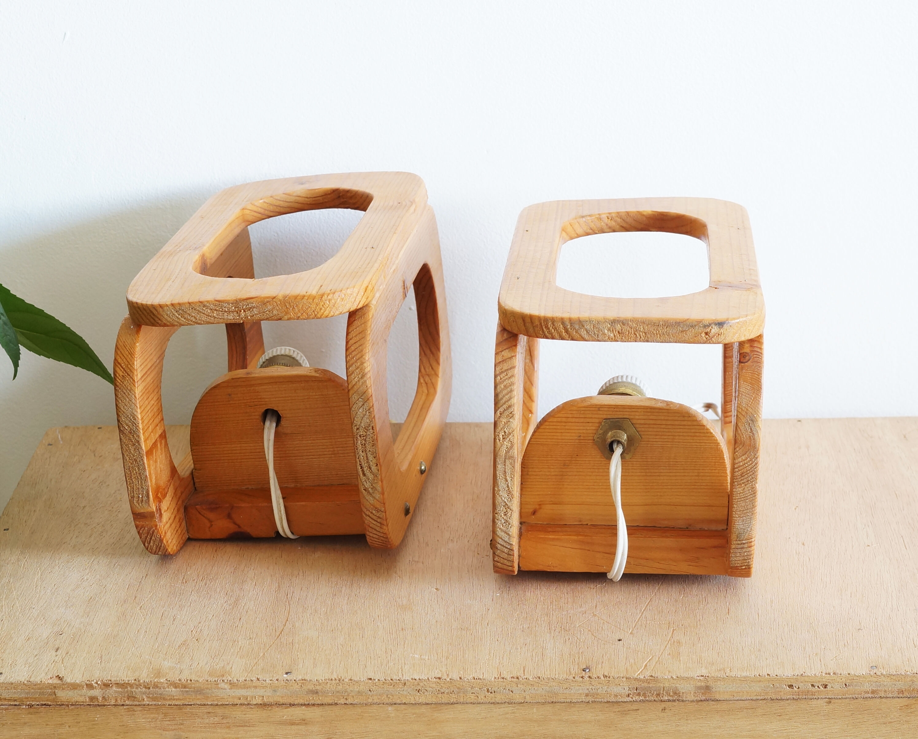 Two Scandinavian pine wall lamps in the 70s