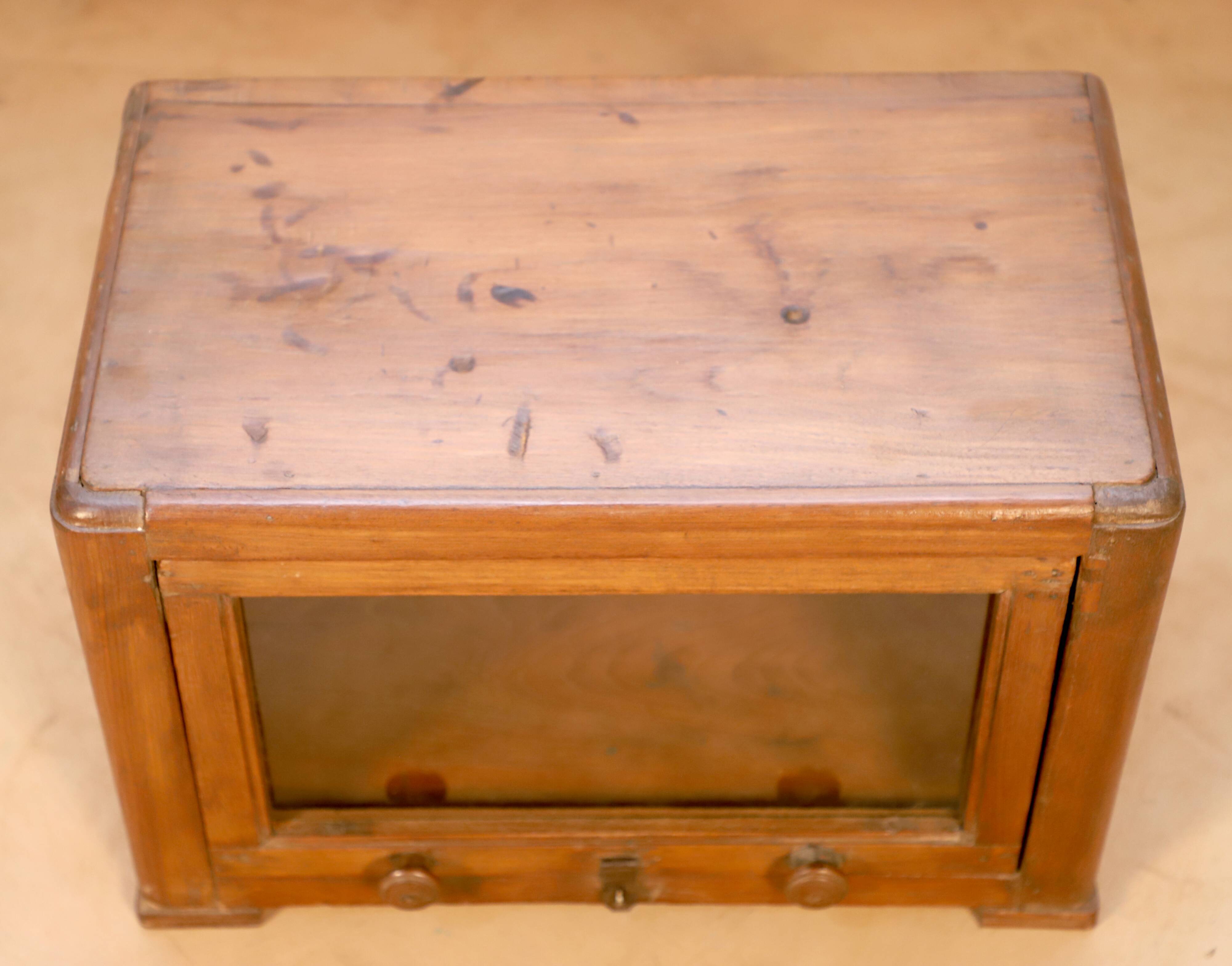 Art Deco showcase in Burmese teak