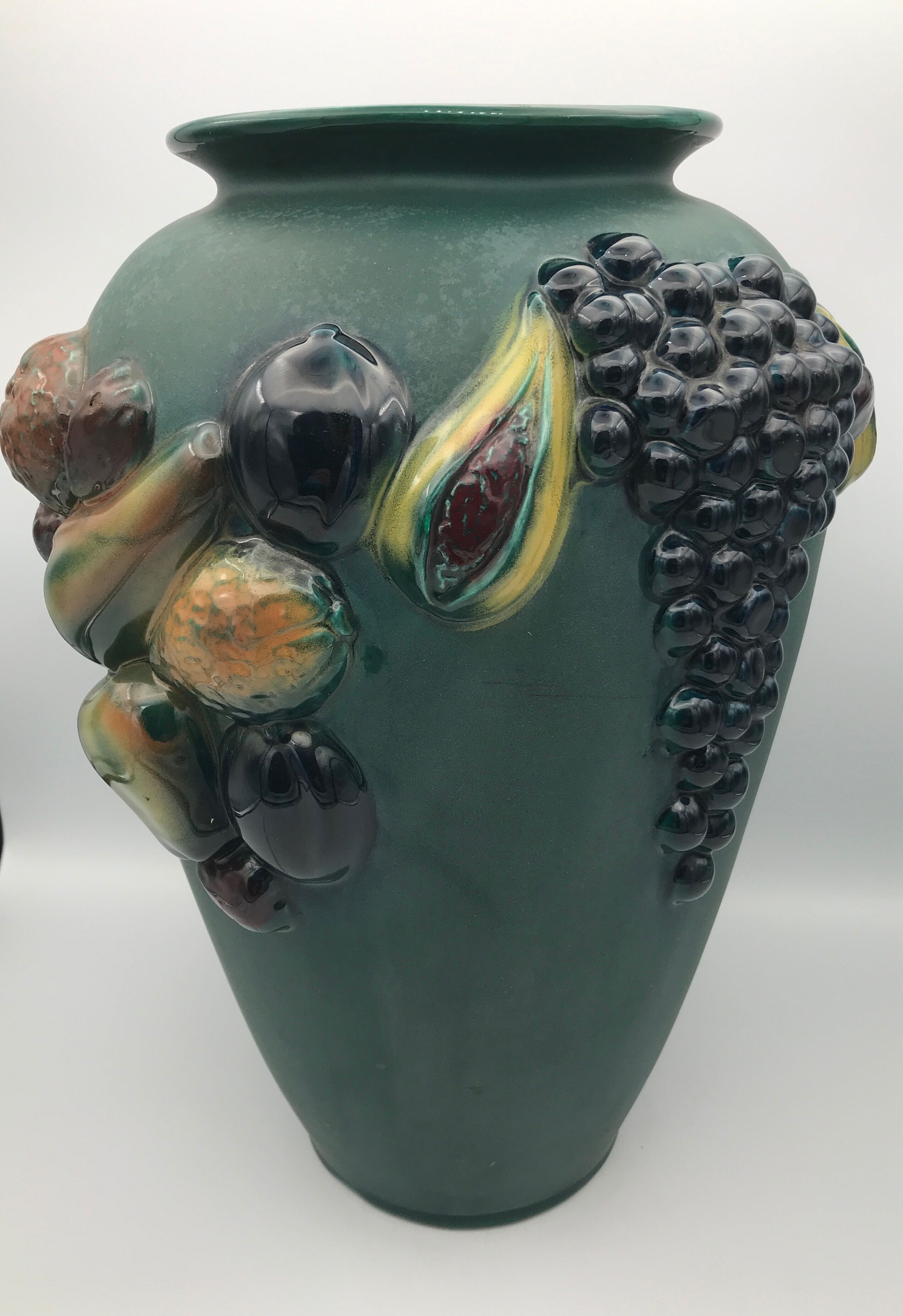 Green ceramic vase with polychrome decoration of fruits and vegetables in relief 33.5 cm