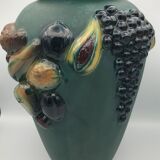 Green ceramic vase with polychrome decoration of fruits and vegetables in relief 33.5 cm