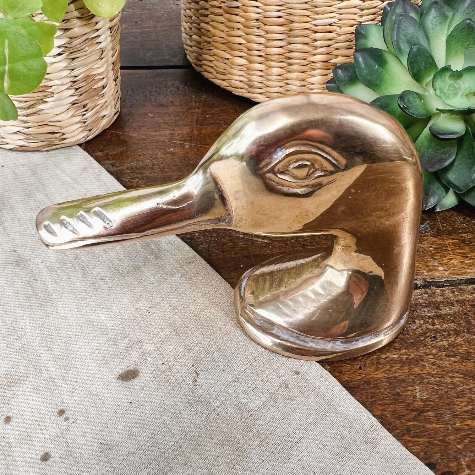 Brass bottle opener duck head