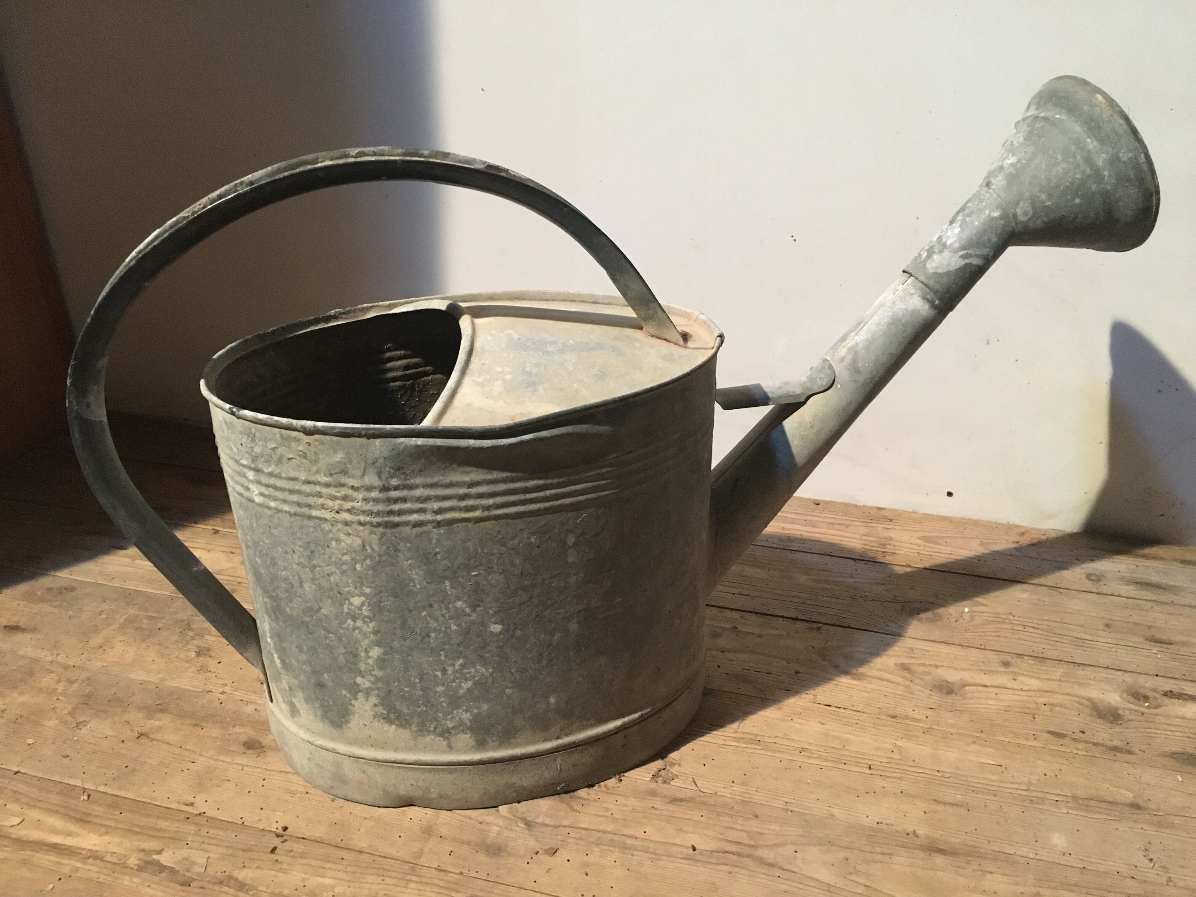 Zinc and copper apple watering can