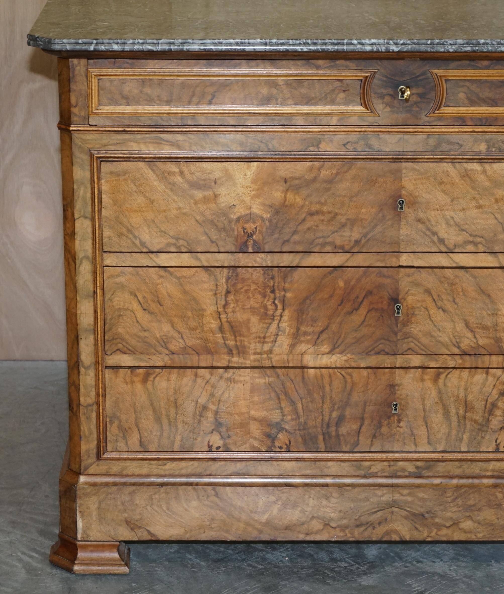 Antique walnut commode from 1860 with a marble top and original key.