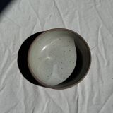 A speckled grey interior bowl with a matte brown exterior H5 D15