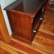 Antique brown pine TV cabinet, carved, with drawer and shelves, traditional style (1890-1919)