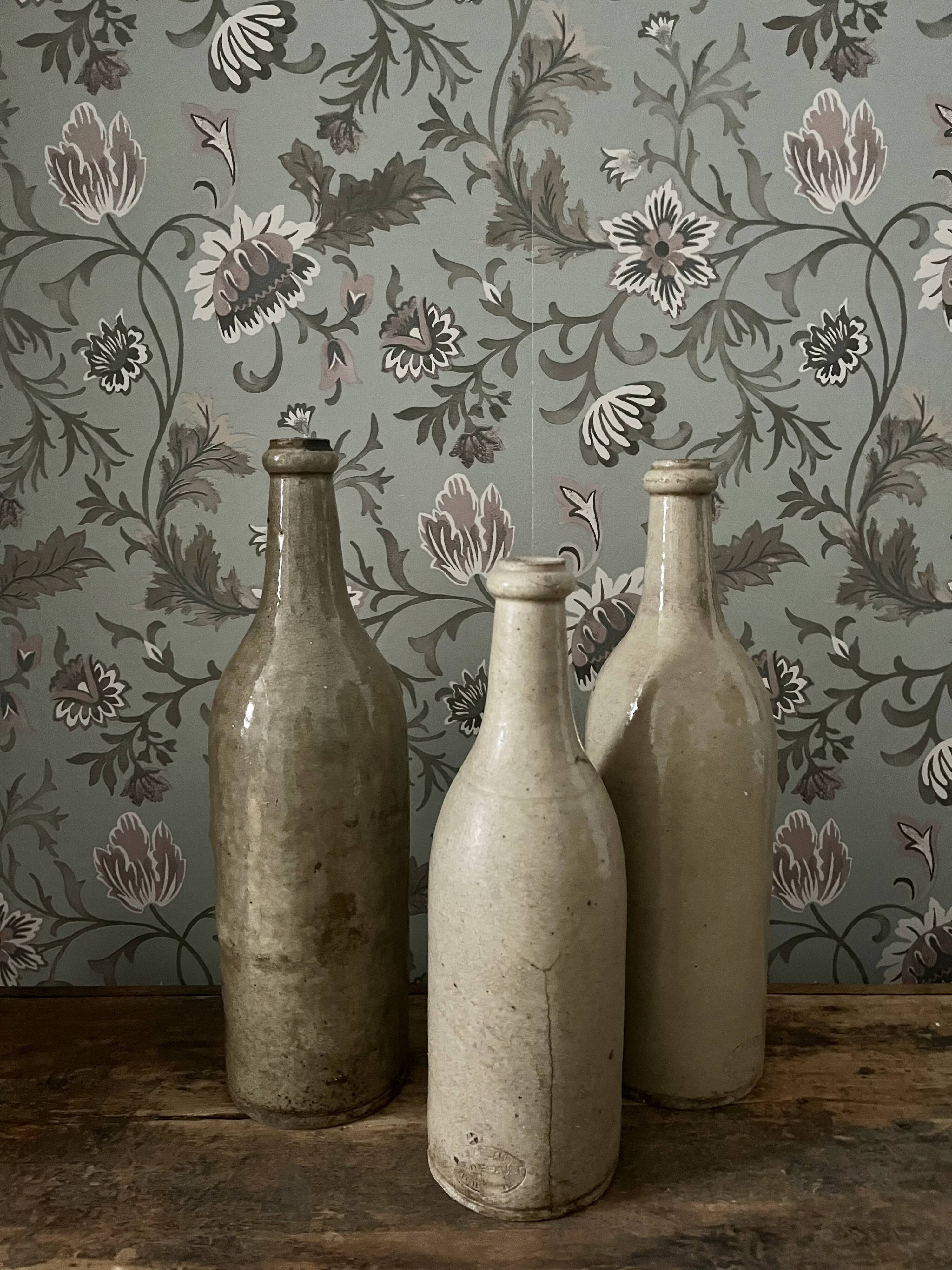 3 antique stoneware bottles