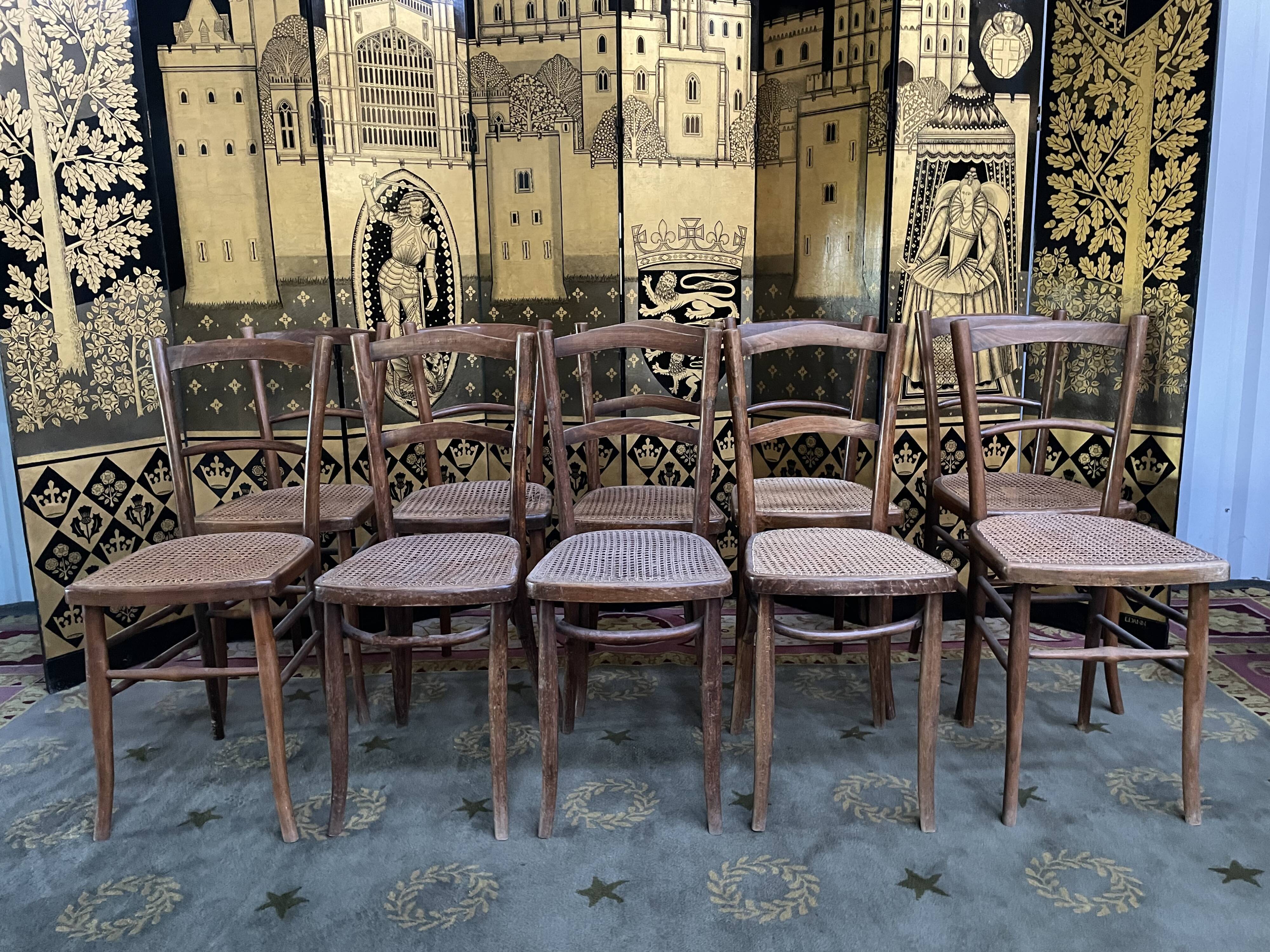 Suite of 10 bistro chairs in cannage