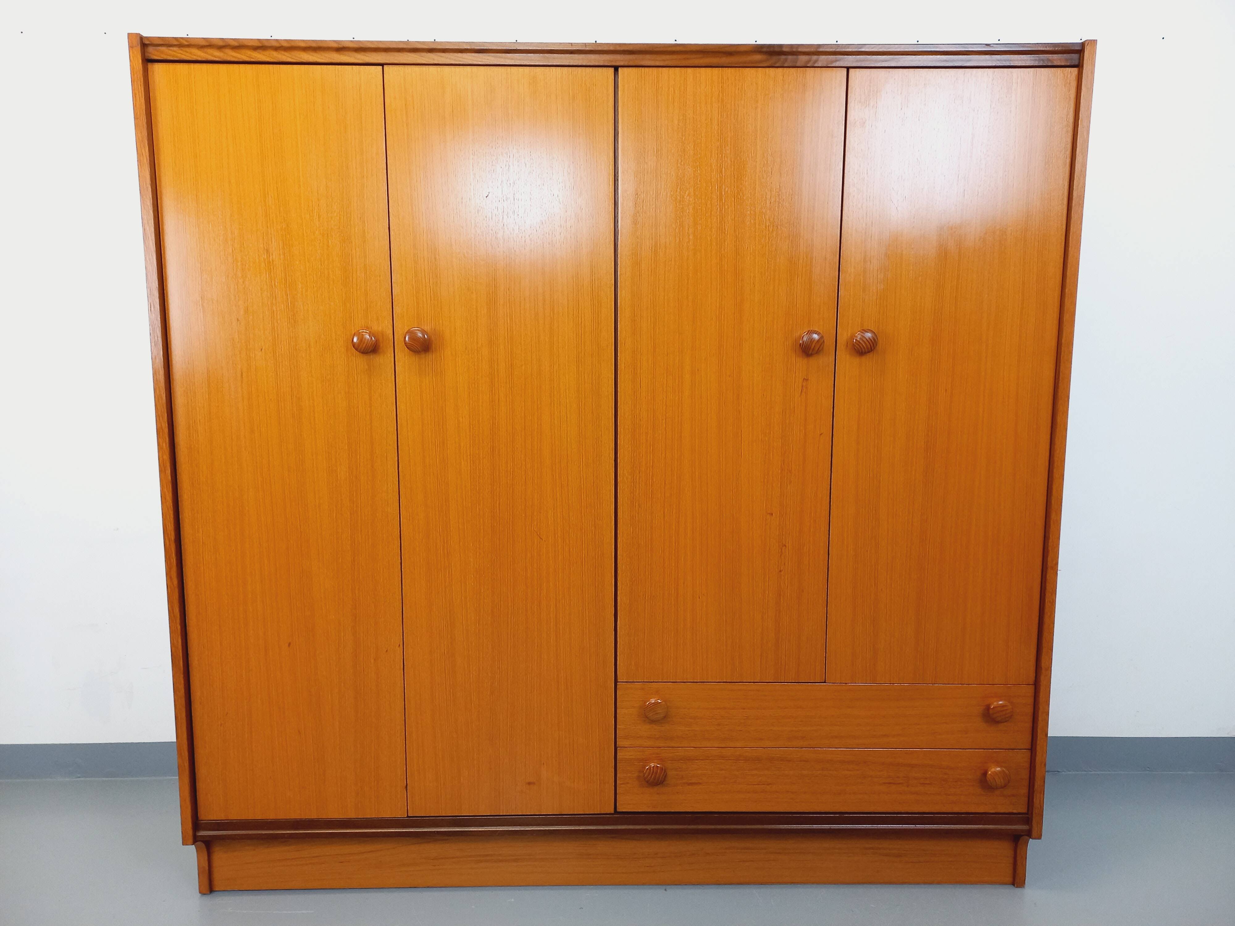 Vintage modernist teak and walnut wardrobe from the 60s and 70s
