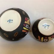 Pair of matte and glazed ceramic vases