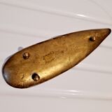 Empty brass leaf pocket