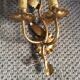 Wall lamp in gold metal