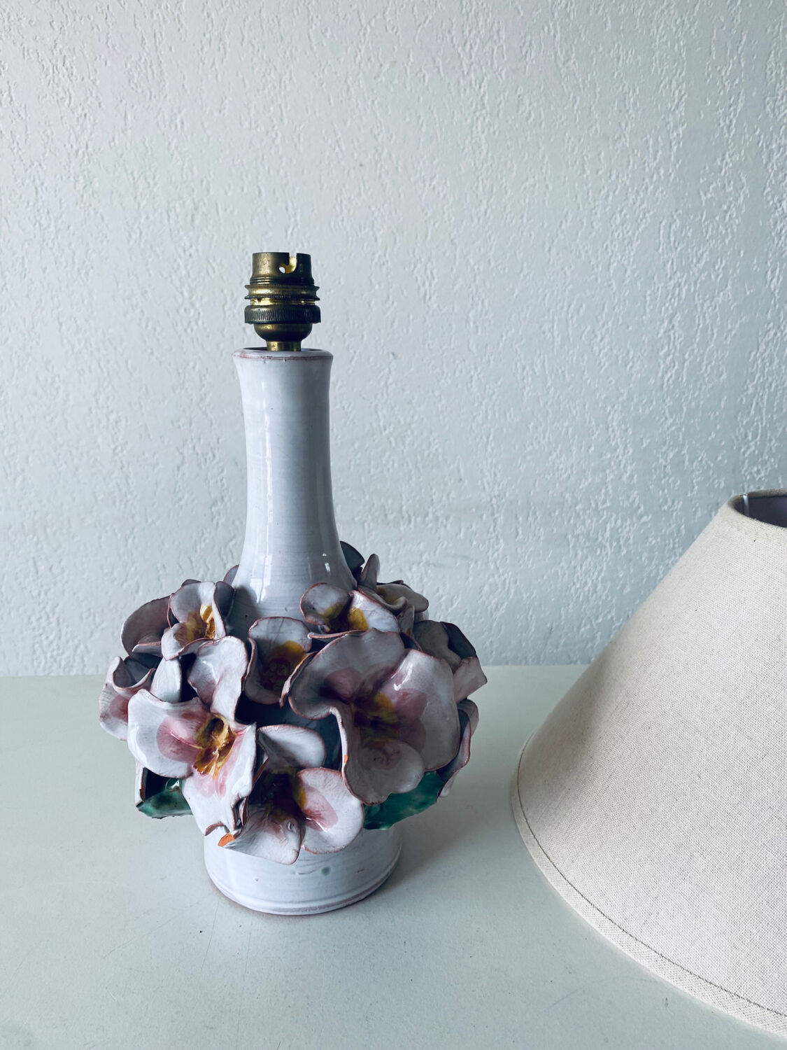 Terracotta lamp flower in relief