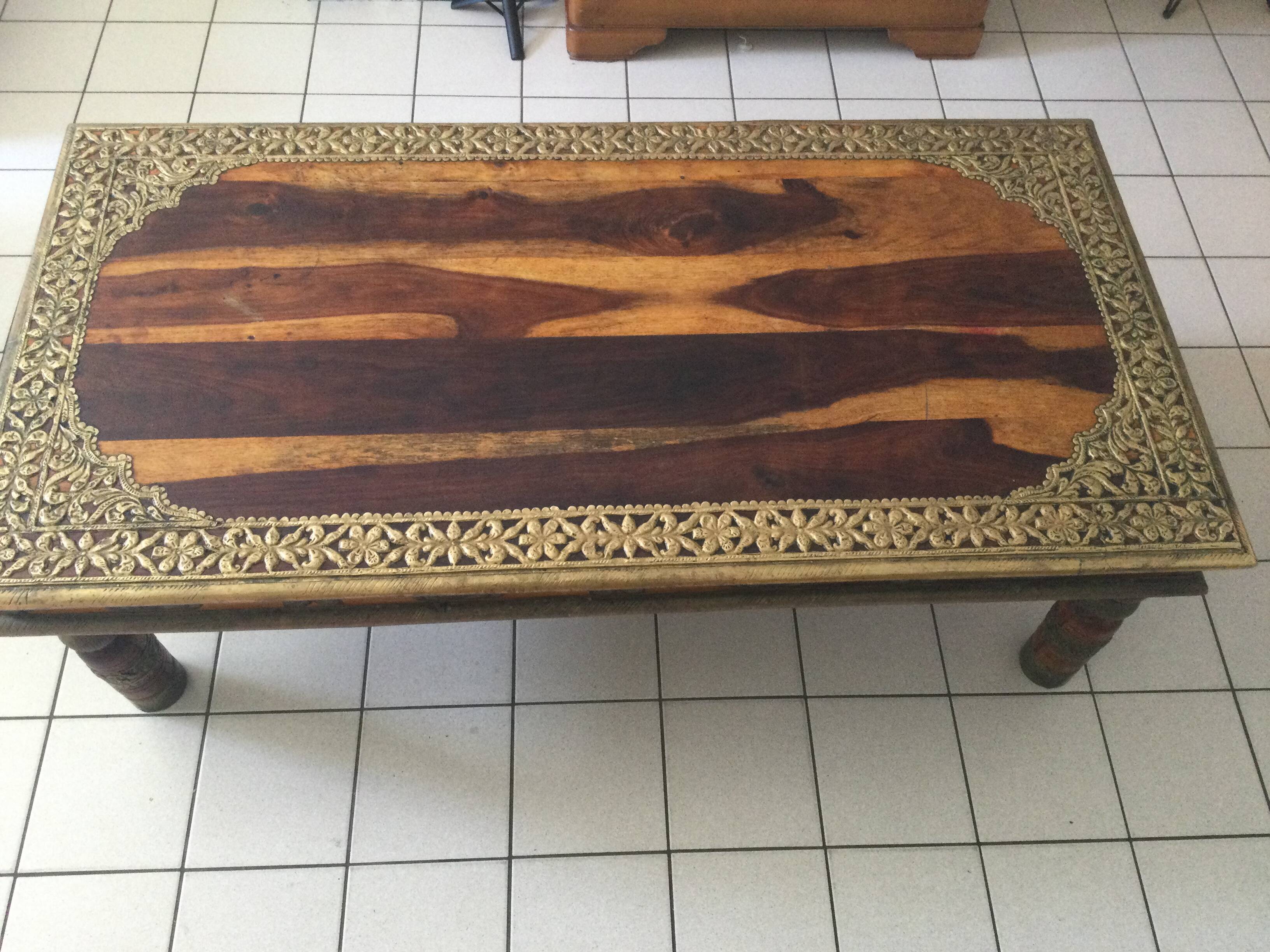 Large vintage Indian coffee table made of solid sheesham wood and brass.
