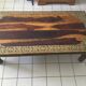 Large vintage Indian coffee table made of solid sheesham wood and brass.