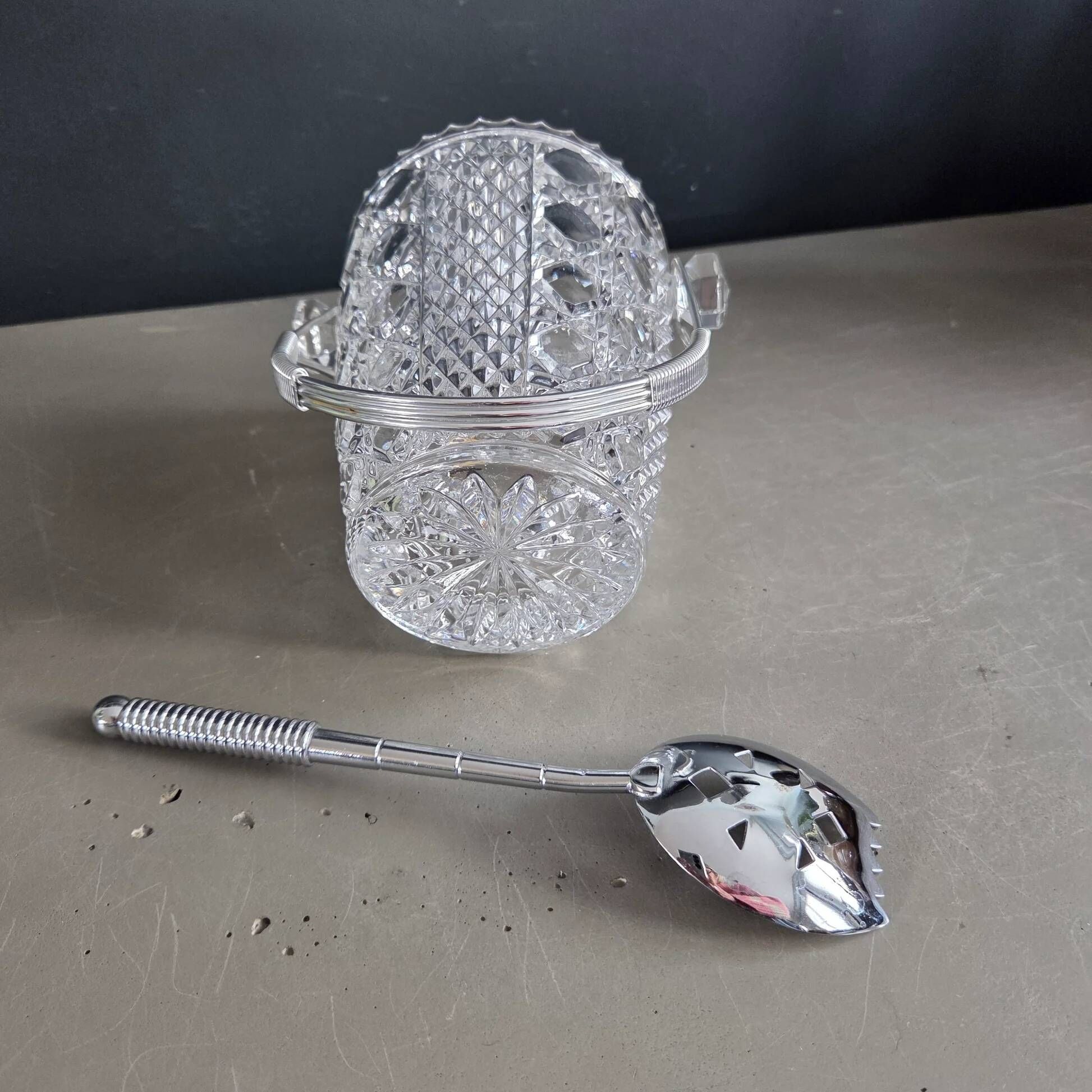 Crystal ice bucket from Bavaria with ice scoop.