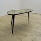 Low mid-century coffee table in formica and wood, Germany 1970.