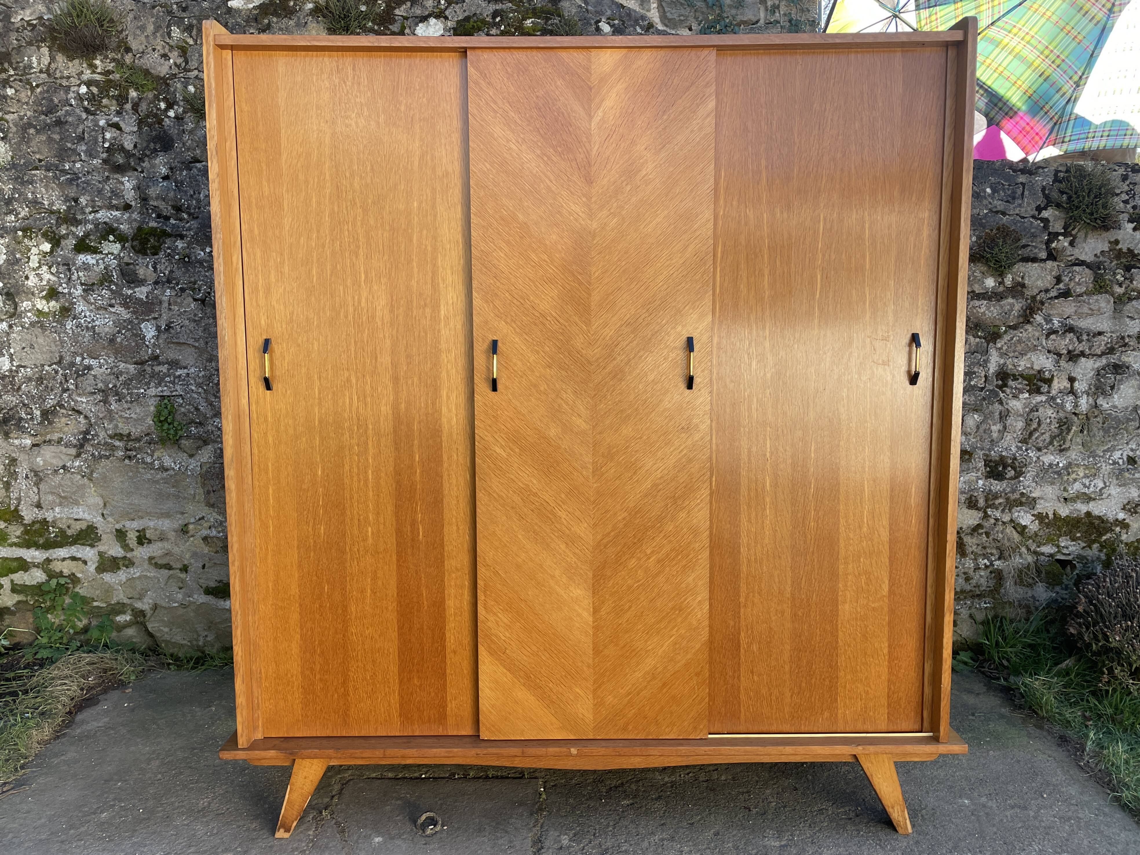Light oak sliding door wardrobe, 1960