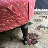 Paire de fauteuils crapaud sur roulettes capitonné