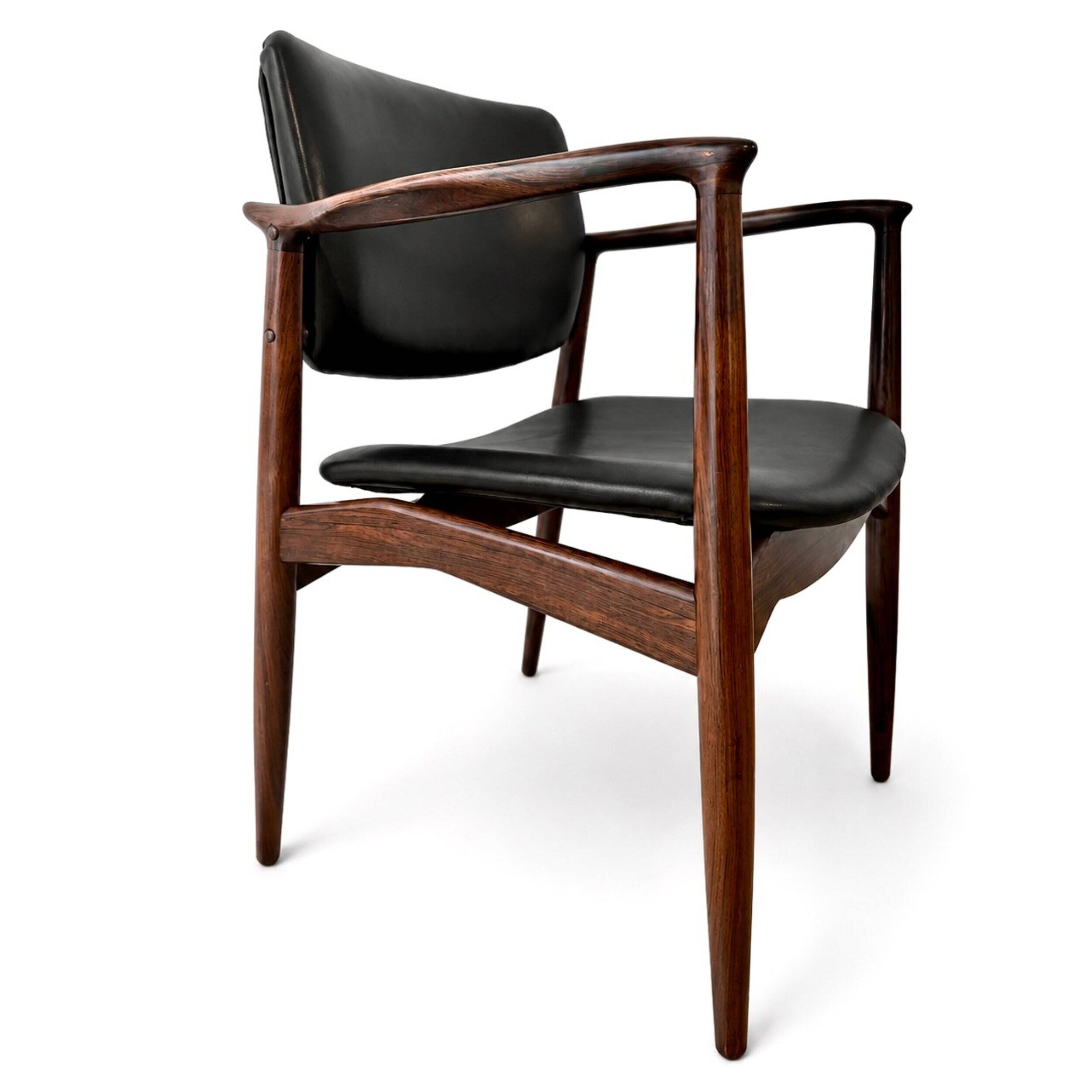Captain armchair in rosewood by Erik Buch