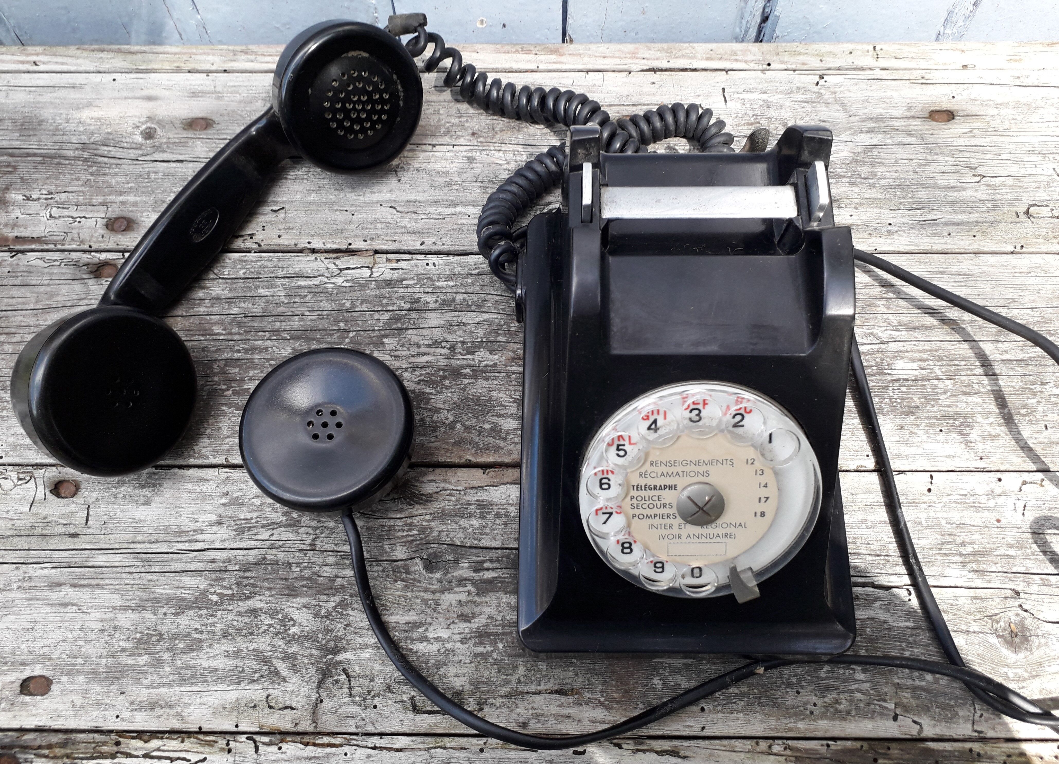 Phone has dial in bakelite