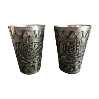 Cups in metal grave
