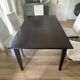 Solid cherry wood dining table, extendable for 8 to 12 people.