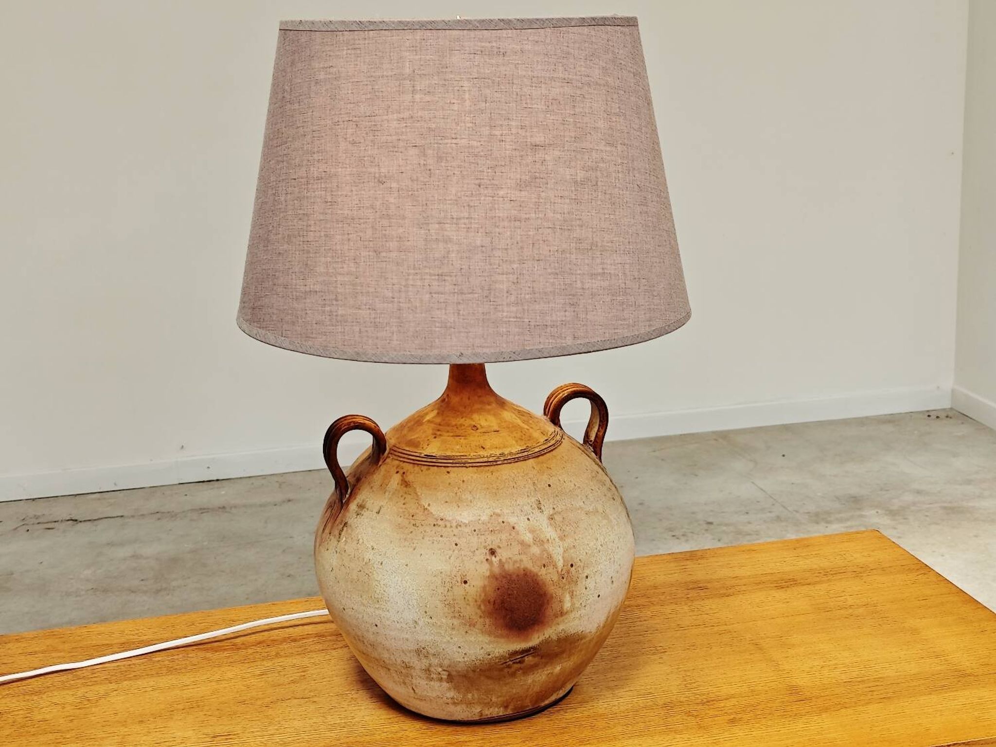 Modernist ceramic sandstone lamp with two handles from the 1950s