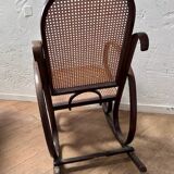 Curved wooden rocking chair