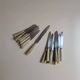 Set of 25 horn and stainless steel knives
