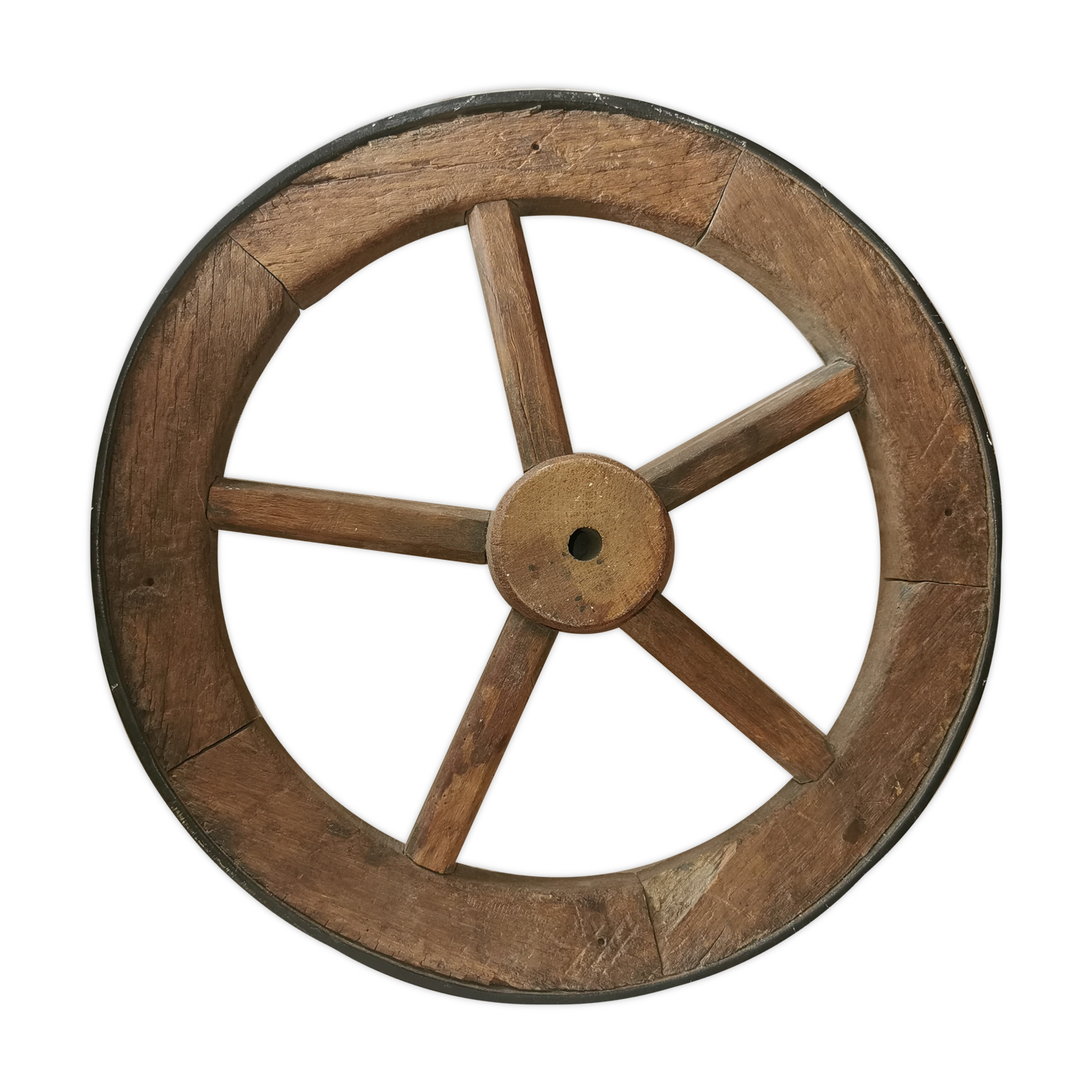 Old wheelbarrow or plow wheel
