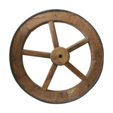 Old wheelbarrow or plow wheel