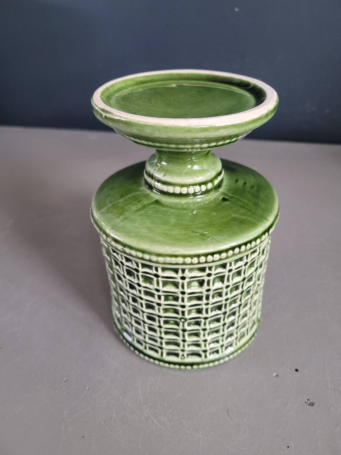 Ceramic flowerpot on stand