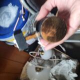 Pair of vintage gold and black wall sconces