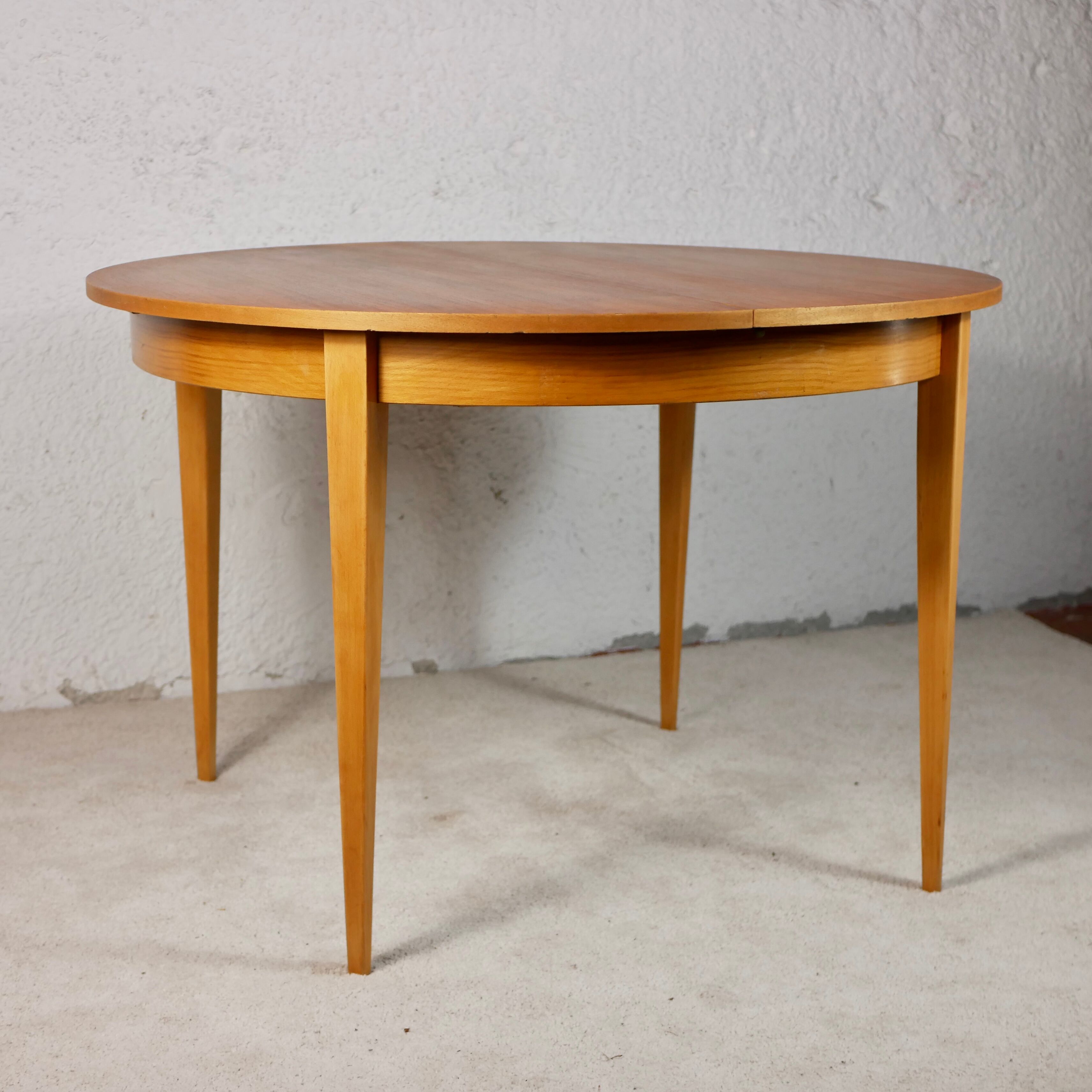 Scandinavian style teak table with butterfly extension