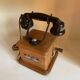 Téléphone en bois vintage années 60