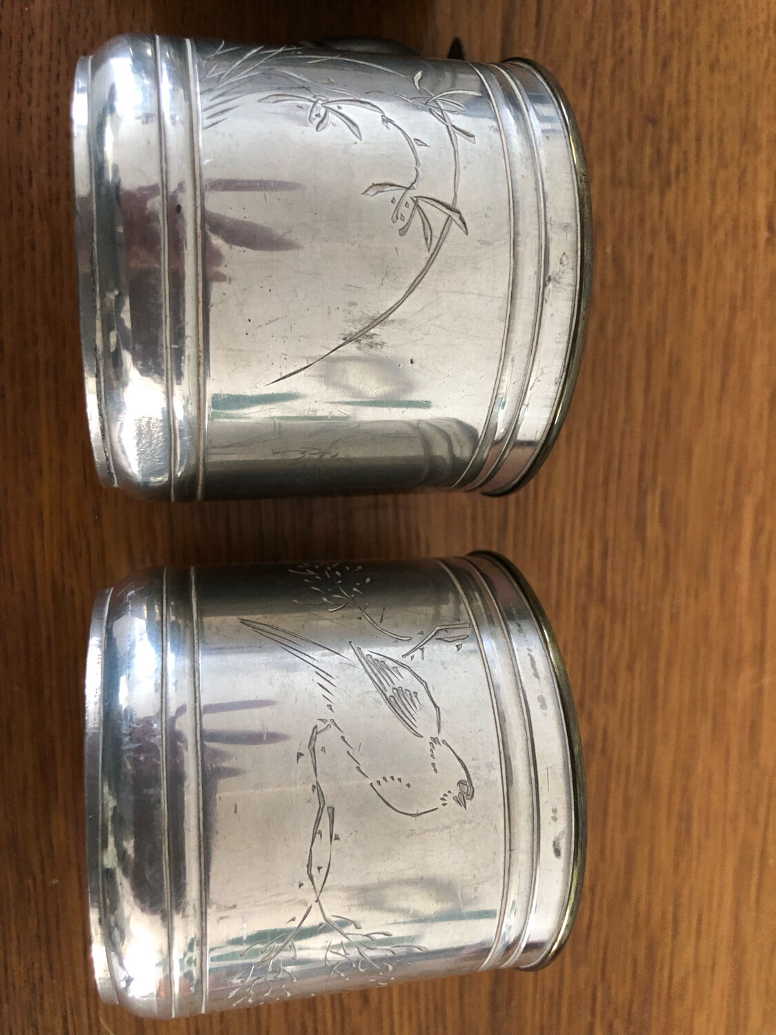 6 cups and sub-cups in pewter motifs birds and flowers and Chinese inscription