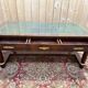 Bureau plat de style Empire en acajou et cuir vert