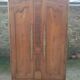 Louis XV Nantaise wardrobe carved with grape clusters, gendarme hat in fine cherry wood, late 19th century.