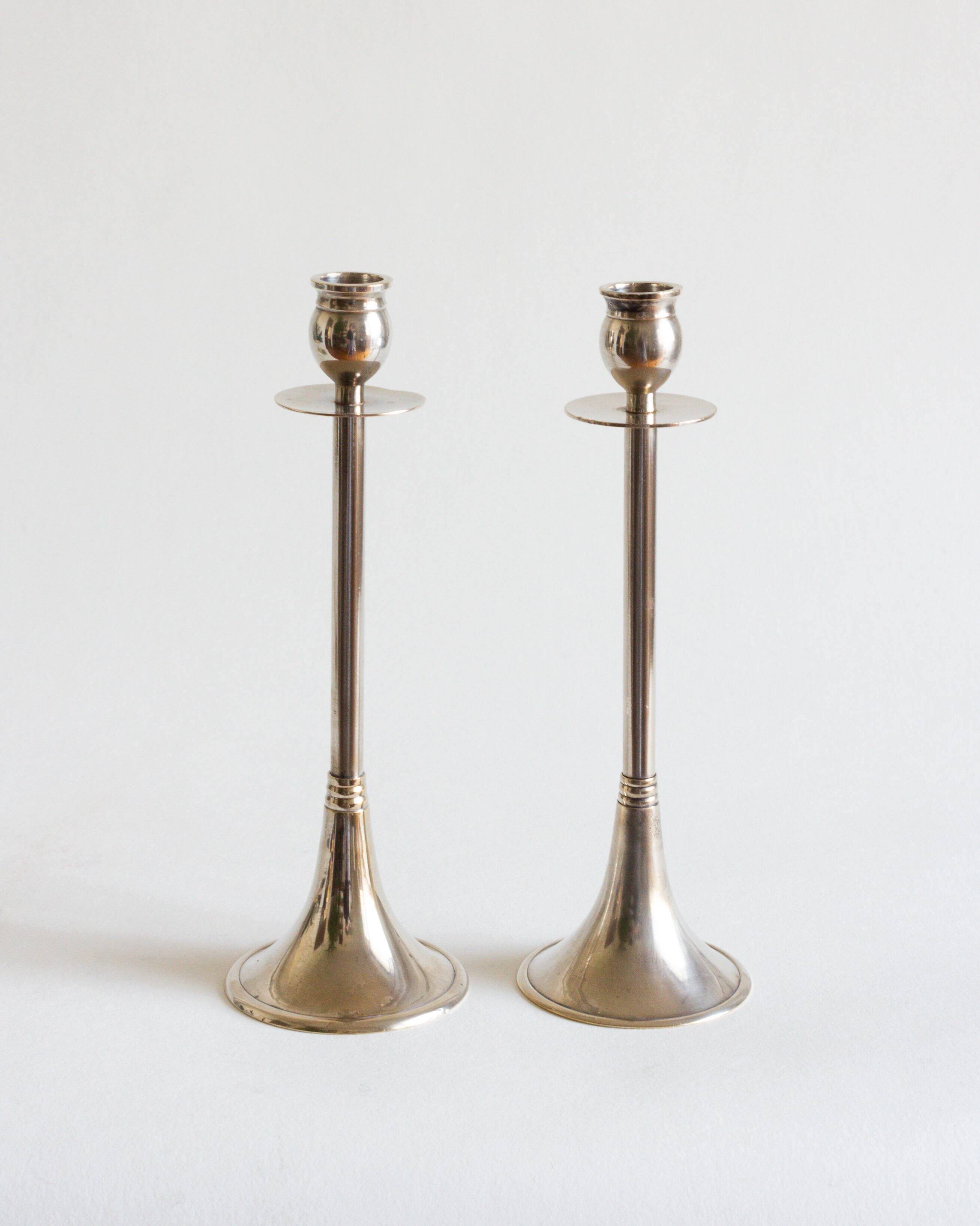 Duo of silver-plated brass candlesticks, 1950s/1960s