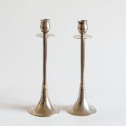 Duo of silver-plated brass candlesticks, 1950s/1960s