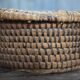 Old wicker basket, straw and bramble, woven basket, countryside.