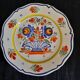 Old flat plate faience henriot quimper basket of flowers decor