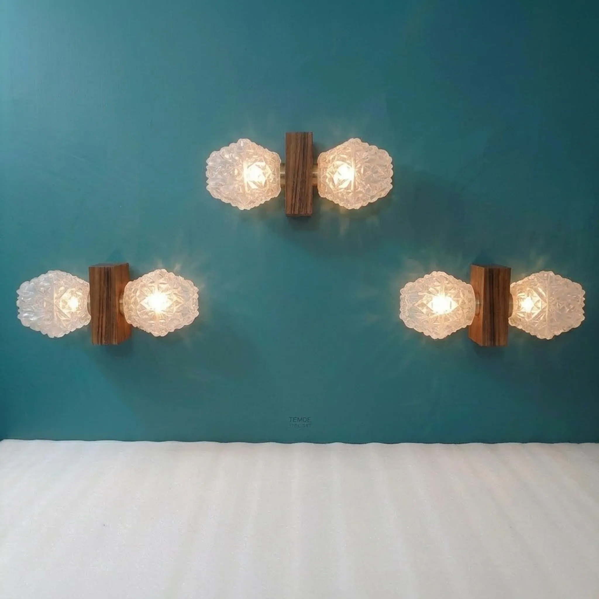 Set of 3 Temde Leuchten wall lights, Teck and frosted glass, 1950-60.