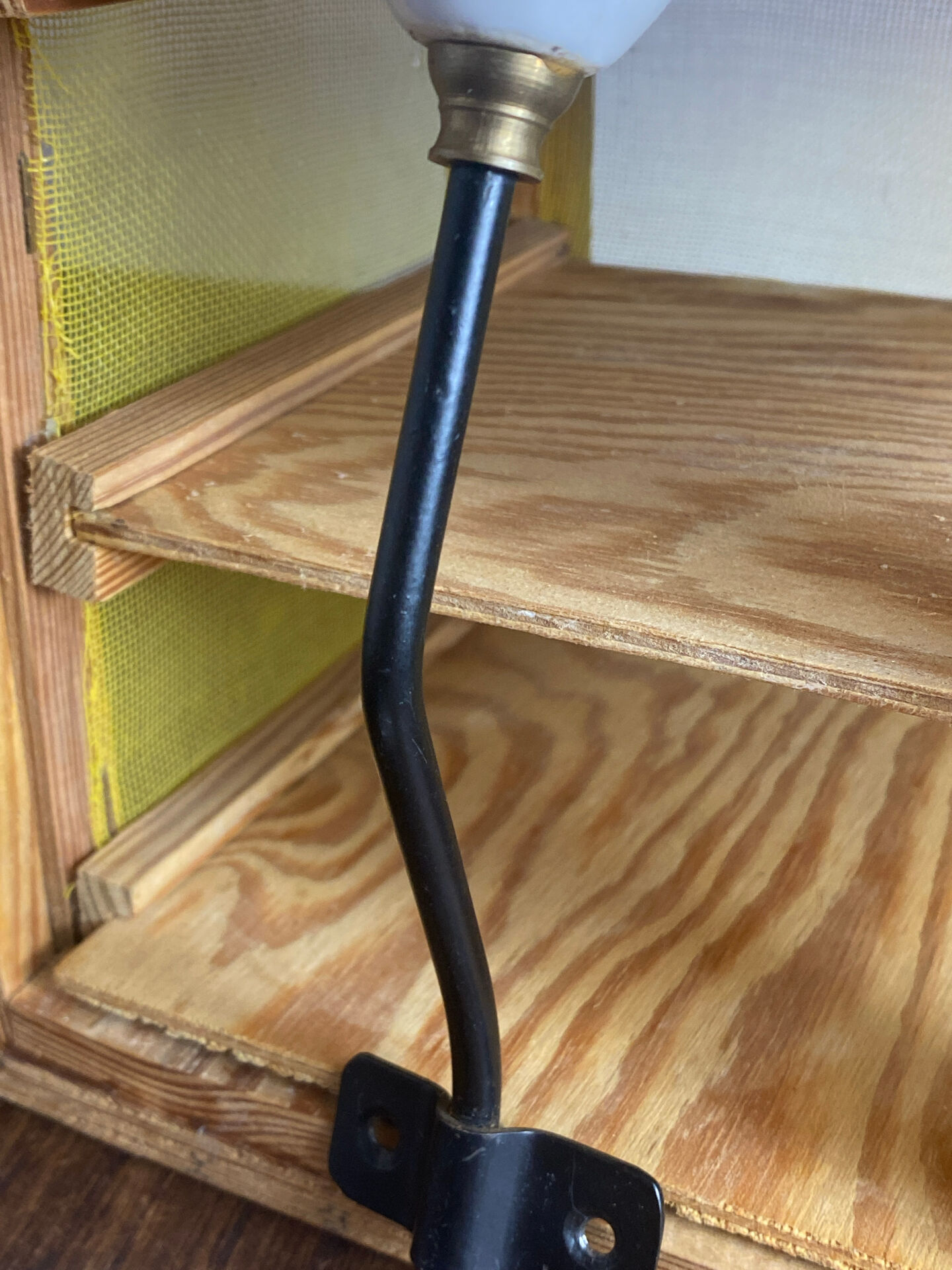 Metal and porcelain hook