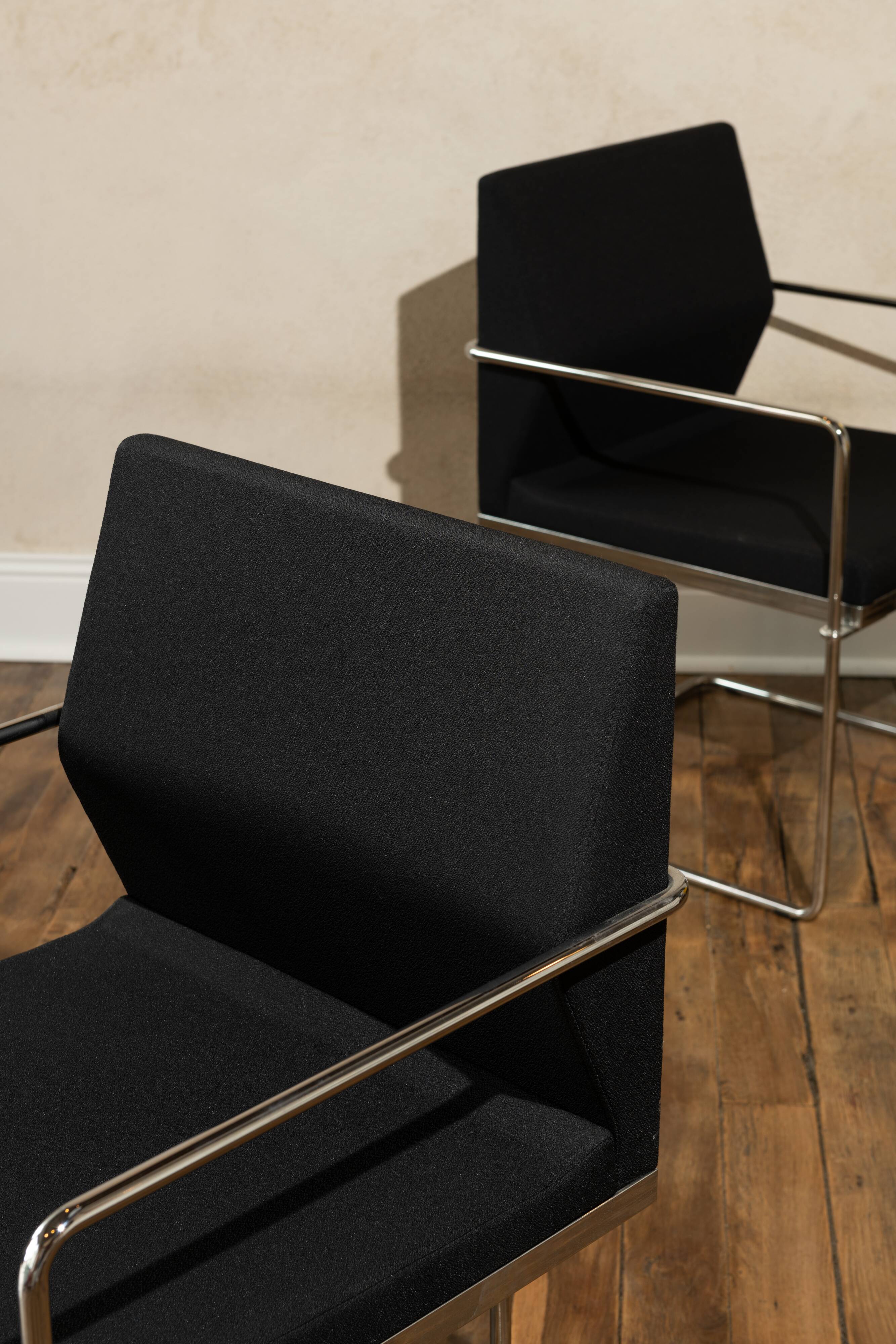 Four armchairs in tubular metal and black fabric 1990