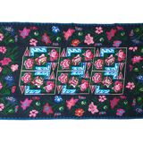 Handwoven floral wool rug, black background with pink roses and geometric design 207x144cm