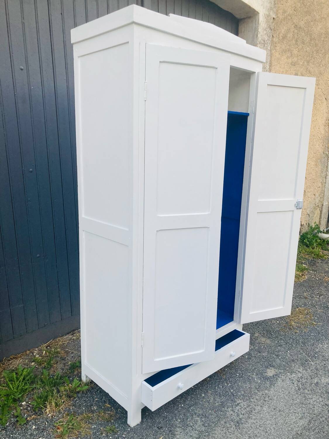 Antique white Parisian wardrobe with Majorelle blue interior